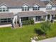 An aerial view showcases the back of the building with a patio at 3926 Grassland Dr, Orlando, FL 32824
