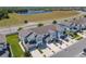 Charming two-story townhome with attached garages and manicured landscaping at 3926 Grassland Dr, Orlando, FL 32824