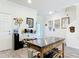 Kitchen view featuring an island, wood-look floors, and a door to the garage at 3926 Grassland Dr, Orlando, FL 32824