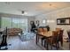 Inviting living room with natural light, sliding glass doors and a cozy atmosphere for relaxation and entertainment at 3926 Grassland Dr, Orlando, FL 32824