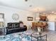 Open-concept living area that flows into the dining room, perfect for Gathering gatherings and entertaining guests at 3926 Grassland Dr, Orlando, FL 32824