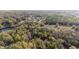 Aerial view of home in wooded area at 39832 N Hibiscus Way, Lady Lake, FL 32159