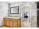 Bathroom featuring double vanity, natural light, and modern tile at 774 Lobelia Dr, Davenport, FL 33837
