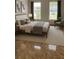 Comfortable bedroom with large windows, neutral decor, and a plush bed at 774 Lobelia Dr, Davenport, FL 33837