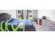 Bedroom featuring natural light, a workspace, and neutral decor at 774 Lobelia Dr, Davenport, FL 33837
