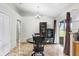 Well-lit dining area with vaulted ceiling and sliding glass doors to the outside at 774 Lobelia Dr, Davenport, FL 33837