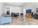 Spacious living room featuring sleek tile flooring, high ceilings, and ample natural light at 774 Lobelia Dr, Davenport, FL 33837