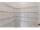 Walk-in pantry featuring adjustable shelving for optimal storage organization at 8734 Sw 55Th Street Rd, Ocala, FL 34481