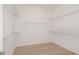 Walk-in closet with built-in wire shelving for optimal organization and storage at 8734 Sw 55Th Street Rd, Ocala, FL 34481