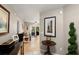 Inviting foyer leading to a living room with natural light at 1007 Cr 463B, Lake Panasoffkee, FL 33538