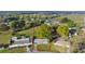 Aerial view of a charming single Gathering home with a mature lawn and property boundaries at 5728 Ne 21St Avenue Rd, Ocala, FL 34479