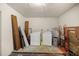 Basement area with washer and dryer hookups and water heater at 5728 Ne 21St Avenue Rd, Ocala, FL 34479