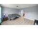 Comfortable living room area showcasing a tiled floor and neutral paint at 5728 Ne 21St Avenue Rd, Ocala, FL 34479