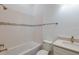 Bathroom with tub, shower, accent tile, and vanity with countertop at 8980 Sw 52Nd Place Rd, Ocala, FL 34481