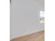 Bright bedroom with wood-look floors and a window at 8980 Sw 52Nd Place Rd, Ocala, FL 34481