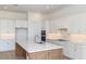 Spacious kitchen with a large island, stainless steel appliances, and ample storage space at 8980 Sw 52Nd Place Rd, Ocala, FL 34481