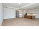 Spacious open living area combining kitchen and dining with wood-style floors and recessed lighting at 8980 Sw 52Nd Place Rd, Ocala, FL 34481