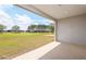 Covered patio with beautiful views of the golf course at 8980 Sw 52Nd Place Rd, Ocala, FL 34481