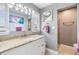 Bathroom features a granite countertop and ample lighting at 4523 Oakglen Rd, Lakeland, FL 33813