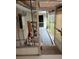 This covered back porch area includes stairs, storage, and an entrance door at 109 Fern Dr, Debary, FL 32713