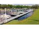 Community boat dock with a long pier and several boats ready for a day out on the water at 109 Fern Dr, Debary, FL 32713