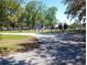 Community playground in a lush park-like setting, complete with swings, slides, and a covered picnic area at 109 Fern Dr, Debary, FL 32713