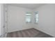 Bedroom with neutral carpet and bright windows at 9056 Wildlight Trl, Wildwood, FL 34785