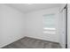 Empty bedroom with carpet and a window at 9056 Wildlight Trl, Wildwood, FL 34785