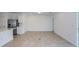 Spacious living area with stainless steel refrigerator at 9056 Wildlight Trl, Wildwood, FL 34785