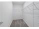 Walk-in closet with wire shelving at 9056 Wildlight Trl, Wildwood, FL 34785