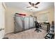 Carpeted bedroom with closet and desk for potential home office space at 13581 Sw 48Th Ct, Ocala, FL 34473