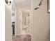 Hallway leading to bathroom featuring bathtub-shower combination at 13581 Sw 48Th Ct, Ocala, FL 34473