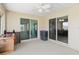 Covered lanai with ceiling fan at 13581 Sw 48Th Ct, Ocala, FL 34473