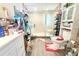 Functional bathroom with glass enclosed shower, white vanity and cabinet, and ample storage for toiletries at 2514 Sea Oats N Cir, Lakeland, FL 33815