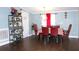 Stylish dining area with modern lighting, and decor, enhanced by rich wood-look flooring at 2514 Sea Oats N Cir, Lakeland, FL 33815