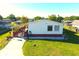 Exterior shot of single-story home featuring a covered carport with a small porch at 2514 Sea Oats N Cir, Lakeland, FL 33815