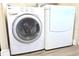 Practical laundry area with front loading washer and dryer, offering convenience at 2514 Sea Oats N Cir, Lakeland, FL 33815
