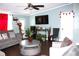Welcoming living room featuring modern decor, stylish furniture, and lots of decorative accessories at 2514 Sea Oats N Cir, Lakeland, FL 33815