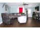 Cozy living room with ample seating, decorative accents, and inviting atmosphere with natural light at 2514 Sea Oats N Cir, Lakeland, FL 33815