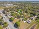 Aerial image of a neighborhood, with abundant trees and easy access to the main thoroughfare at 4524 Oak Arbor Cir, Orlando, FL 32802