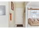 Welcoming entryway with neutral walls, tile flooring, and a view of the living room at 4524 Oak Arbor Cir, Orlando, FL 32802