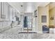 Bright kitchen with granite counters, mosaic backsplash, and stainless steel appliances at 4524 Oak Arbor Cir, Orlando, FL 32802