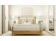 Bright bedroom featuring a light wood bed frame, matching nightstands, and a minimalist aesthetic at 4566 Ochos Rios Pl, Kissimmee, FL 34758