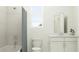 Clean bathroom with shower/tub, white vanity, toilet, and simple, elegant fixtures at 4578 Ochos Rios Pl, Kissimmee, FL 34758
