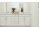 Elegant bathroom with a double vanity, offering ample counter space and storage at 4578 Ochos Rios Pl, Kissimmee, FL 34758
