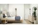 Comfortable bedroom showcasing a stylish bed, soft lighting, and neutral colors for a relaxing retreat at 4578 Ochos Rios Pl, Kissimmee, FL 34758