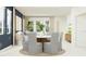 Bright dining area featuring a round table with six chairs, perfect for Gathering meals and entertaining at 4578 Ochos Rios Pl, Kissimmee, FL 34758