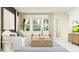 Bright living room features a neutral color palette, comfortable seating, and lots of natural light at 4578 Ochos Rios Pl, Kissimmee, FL 34758