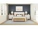 Serene main bedroom featuring a plush bed, stylish nightstands, and ample natural light at 4578 Ochos Rios Pl, Kissimmee, FL 34758