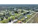 Waterfront community home with canals in backyard, offering scenic views and boating opportunities at 6365 Avocado Dr, Indian Lake Estates, FL 33855